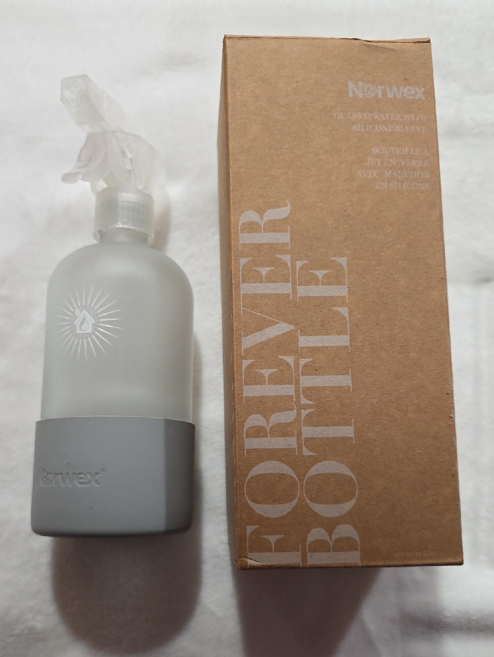 Norwex Grey Frosted Glass Spray Bottle with Gray Silicone Sleeve